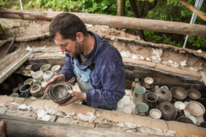 Removing the wood-fired stoneware